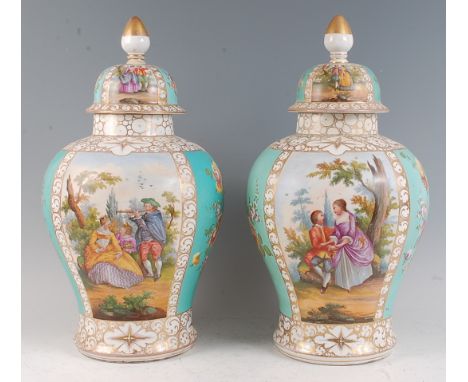 A pair of late 19th century Dresden porcelain vases and covers, each panel decorated with alternating reserves of courtship s