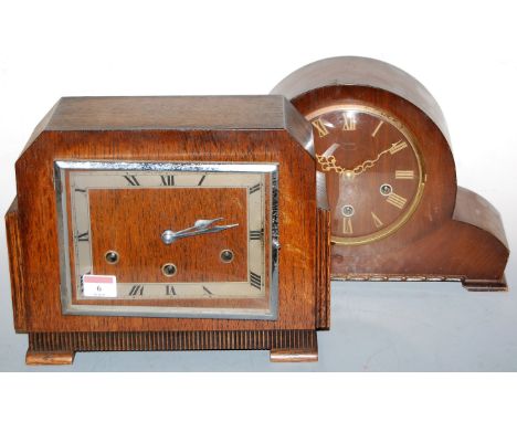 An Art Deco oak cased mantel clock, having a silvered dial with Roman numerals, and chiming mvoement; together with a mid-20t