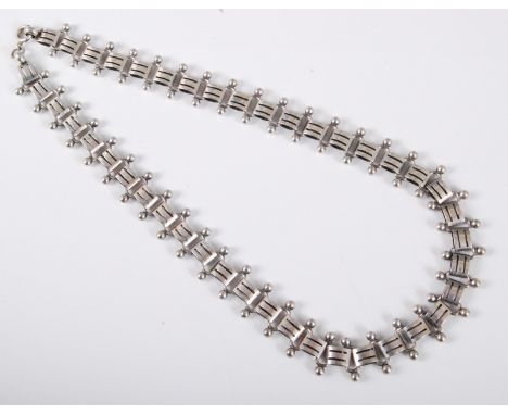 A silver necklace, the square links with double ended beaded connecting links, with jump ring clasp stamped 'Sterling', 45cm 