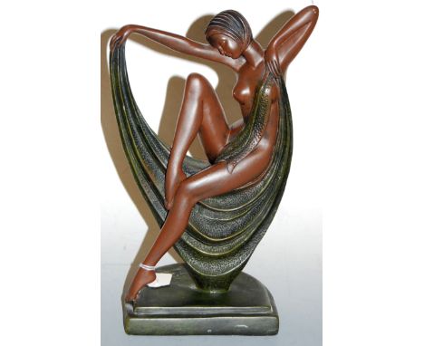 An Art Deco style resin figural table lamp base, in the form of a semi-nude dancer, h.36cm