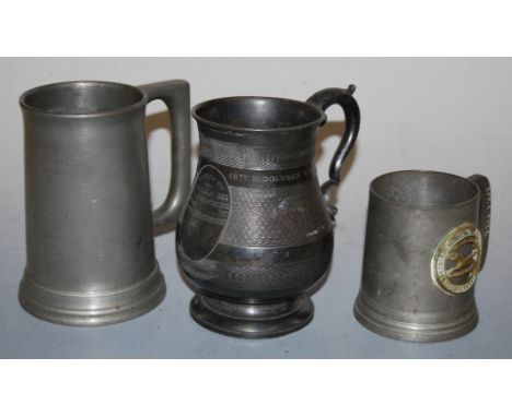 A Victorian pewter tankard, with presentation inscription 'First Surrey Rifles prize competition 1894'; together with two oth