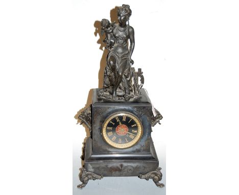 A late 19th century black slate cased mantel clock having enamel dial with gilt Roman numerals and eight day movement, the wh