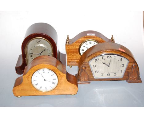 A small Edwardian mahogany and chequer strung mantel clock having an enamel dial with Roman numerals together with an Art Dec
