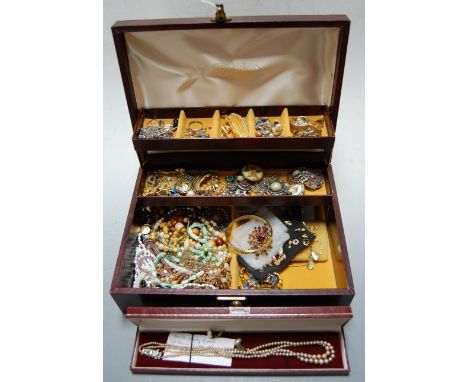 A leather clad jewellery box and contents to include a double string pearl choker, gold plated bangle, various paste set broo