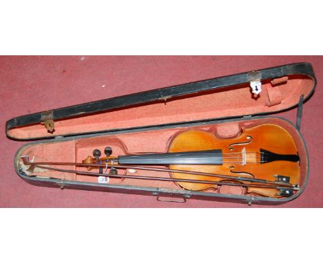 An early 20th century Continental violin having an ebony fingerboard and two piece back, 36cm (excluding button) with violin 