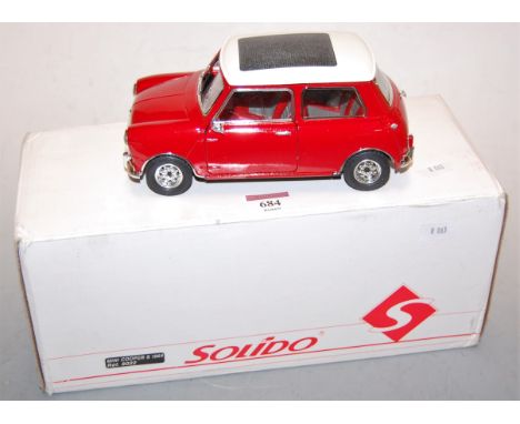 A boxed Solido Mini Cooper S 1964
