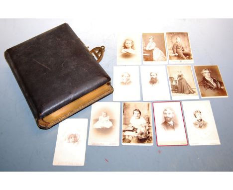 Three Victorian leather bound photograph albums (empty); together with a large quantity of loose photographs to include topog