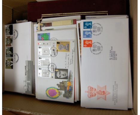 A box of assorted Royal Mail first day covers