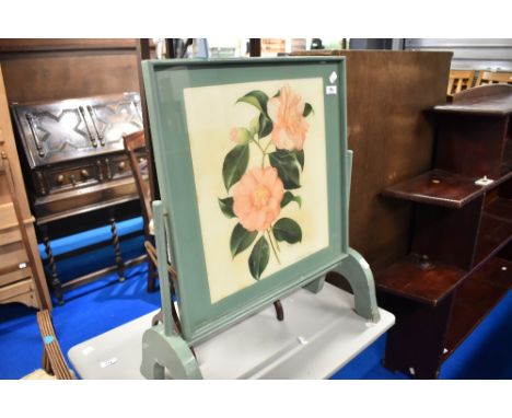 A vintage folding firescreen table