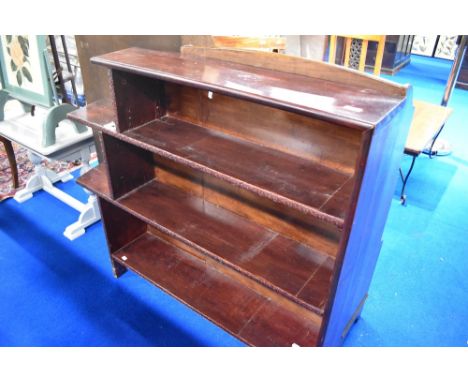 A vintage stained frame bookshelf having historical light fitting (not connected/not safe)