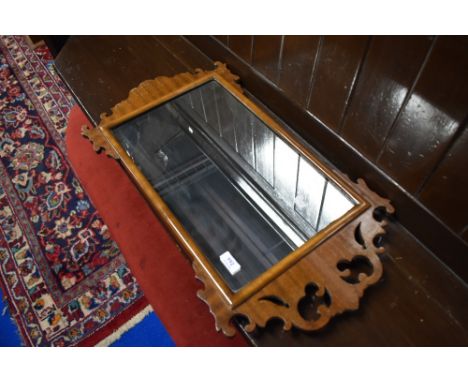 A Victorian mahogany chippendale style wall mirror