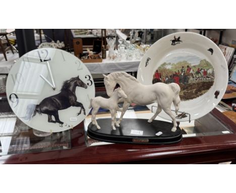 A Royal Doulton spirit of affection white horse group glass wall clock &amp; A large hunting scene meat plate