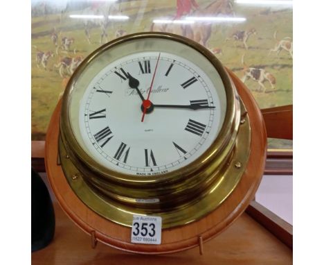 A mid 20th century ships battery clock