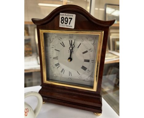 A Comitti of London quartz mantel clock