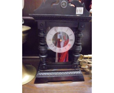 An Edwardian mantle clock in working order. COLLECT ONLY.