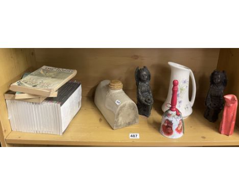 A shelf of miscellaneous items including Pottery &amp; books