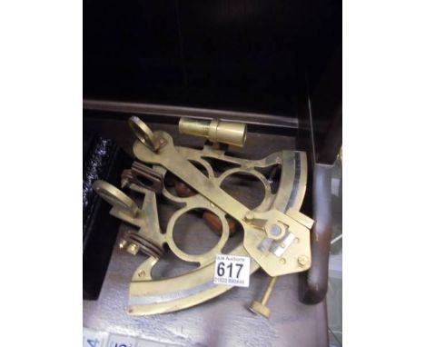 A good 20th century copy of a brass sextant.