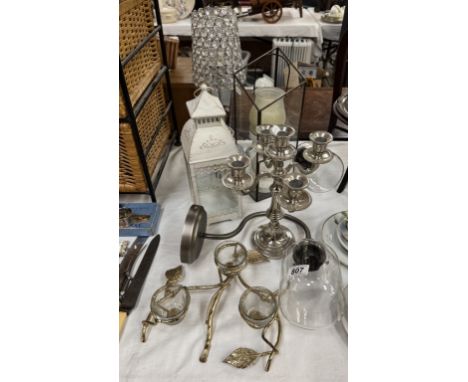 A quantity of lighting including a pair of wall lights, candelabra etc