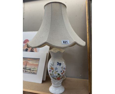 An Aynsley table lamp with shade.