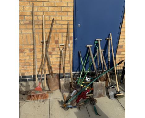 A large assortment of garden tools
