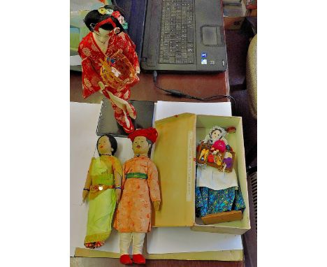 Vintage Dolls-with street vendor doll, Japan and India,(4 dolls) on plinth 1' x 1.1/2' high.