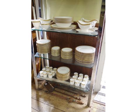 A Royal Worcester 'Davenham Gold' pattern porcelain service, comprising: three oval serving plates, 34cm wide; six oval veget