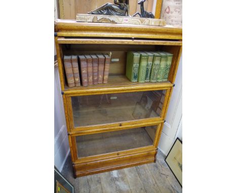 An early 20th century Globe-Wernicke oak three tier sectional bookcase,&nbsp;86.5cm wide. 