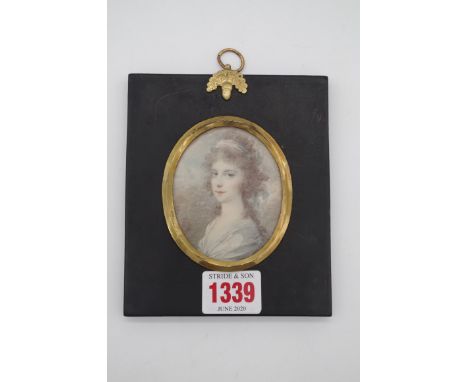 English School, late 18th century, portrait miniature of a young lady, watercolour on paper, 7.2 x 5.3cm oval. 