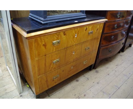A Biedermeier birch and ebonized commode,&nbsp;108cm wide. 