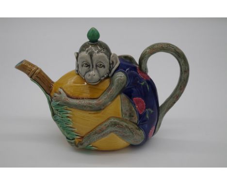 A Victorian Mintons majolica novelty monkey teapot and cover,&nbsp;impressed marks and model number 1844, 15cm high. 