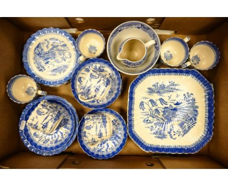A collection of Blue &amp; White tea ware to include cake plates, 7 cups, 12 saucers, 11 side plates, sugar bowl and milk jug
