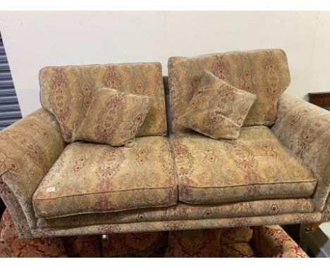 Parker Knoll large 2 seater Sofa with multi coloured fabric covering on turned front supports &amp; brass castors 205cm W x 1