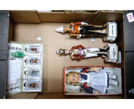 A mixed collection of items to include boxed Chinese glass bottles, two ceramic officer figures, boxed doll etc ( 1 tray) 