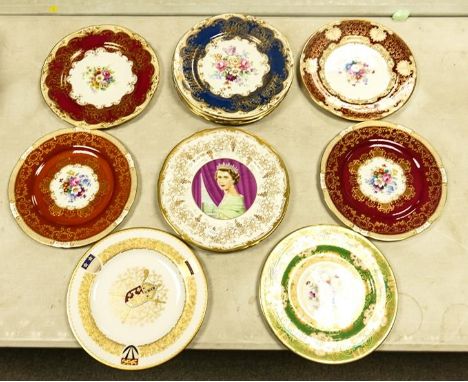 A collection of Crown Staffordshire floral and gilt wall plates together with a Spode Lichfield Catherdral plate (12) 