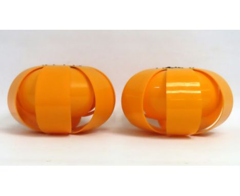 A pair of 1960's Lotus perspex light shades