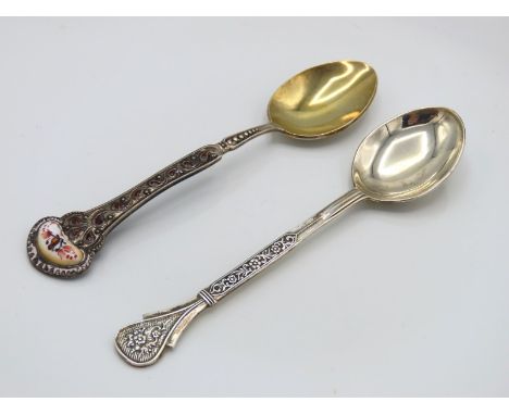 An 0.875 silver spoon twinned with an enamelled white metal spoon with gilt bowl, indistinct mark, fault to top part of ename