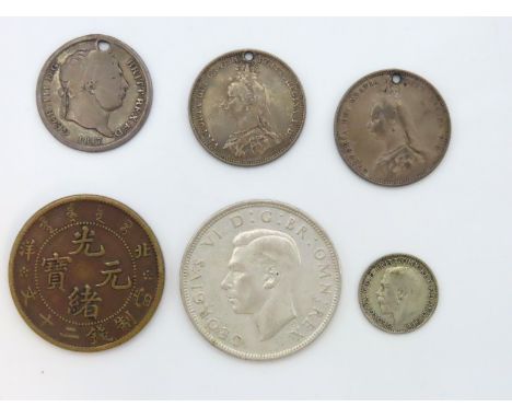 A Chinese 20 Cash coin, a 1942 half crown & a 1921 threepences twinned with two worn Victorian silver coins & one worn Georgi