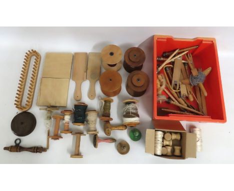 A quantity of mixed haberdasher tools including fabric weights, bobbins, darning mushrooms etc.