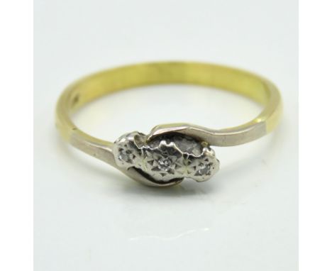 An antique 18ct gold ring set with three small diamonds, 2.8g, size R