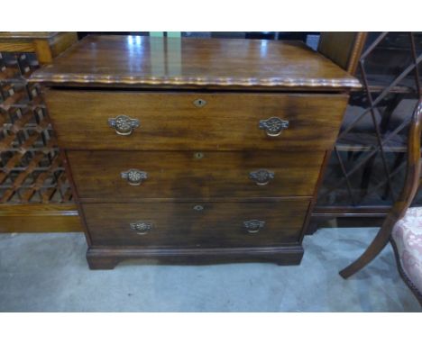 A mahogany chest of three long drawers with wave edge boarder to top and raised on bracket supports - 92cm x 53cm x 83cm high