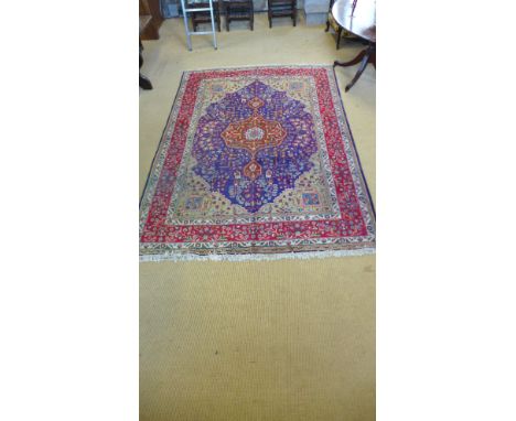 A fine Tabriz carpet in green field - 283cm x 203cm 
Condition report: In good condition