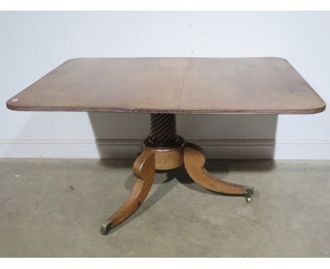 A 19th century mahogany tilt top breakfast table on a Trafalgar twist column and tripod base possible replacement top - 75cm 