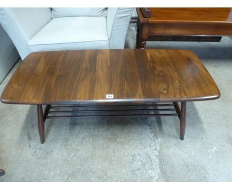 A circa 1970's Ercol elm coffee table - 37cm x 105cm x 46cm 