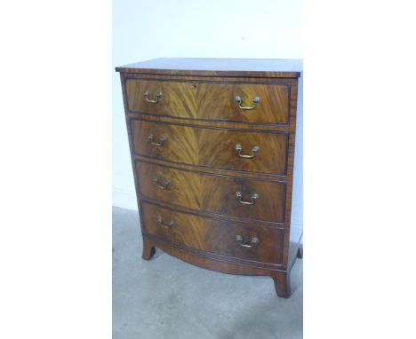 A 20th century mahogany bowfronted chest with four drawers on splayed bracket feet - Height 107cm x Width 86cm x Depth 43cm