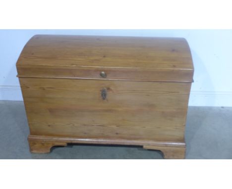 A very unusual 19th century stripped and waxed dome top dowry trunk with removable interior tray, bracket feet concealing woo