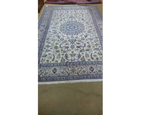 A beige ground handmade very fine part silk Persian Nain carpet - 3.50m x 2.50m 