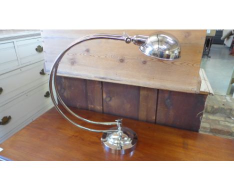 A half moon shaped nickel plated desk lamp - 55cm x 55cm 
Condition report: As new 