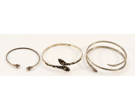A 925 silver gemset snake bangle, an 800 silver snake bangle, and a silver rams head bangle, 41g