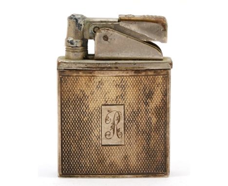 A sterling silver petrol lighter, with 'R' engraved to the front, 5cm.