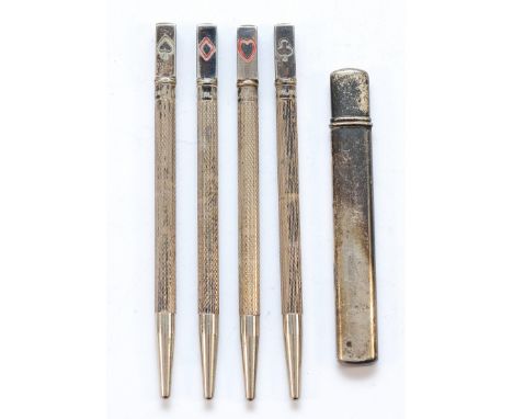 Four sterling silver twist action pencils, having the four playing card suits to the tops, together with a silver pencil hold